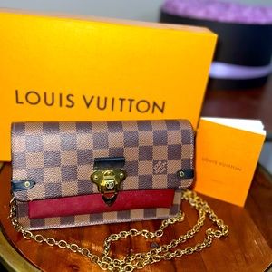 Authentic LOUIS VUITTON Damier Ebene
Vavin Chain Wallet in RED